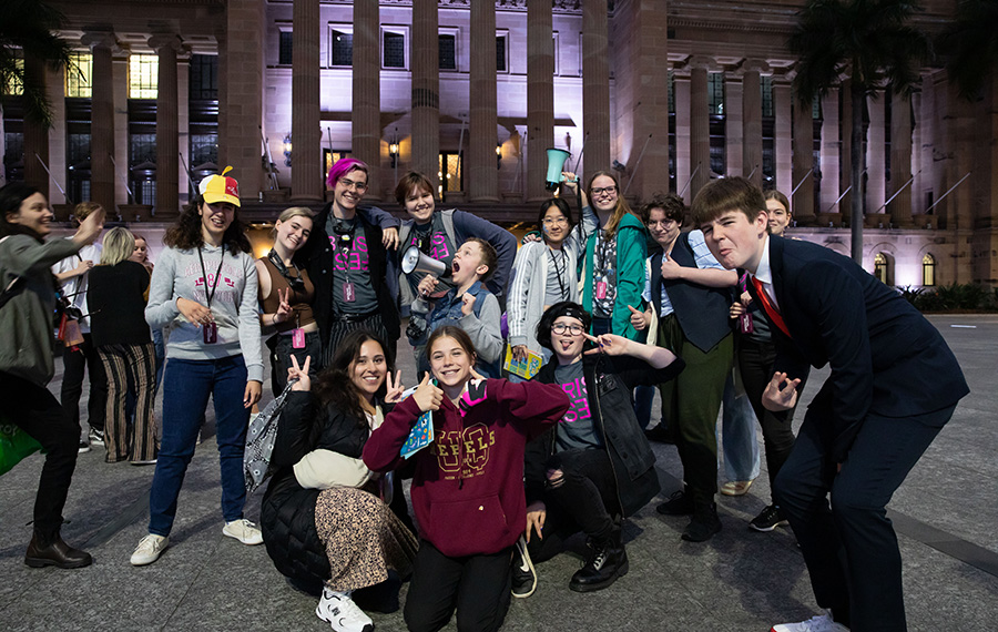Teens pose at the Nightwalks With Teenagers event held in Brisbane City.