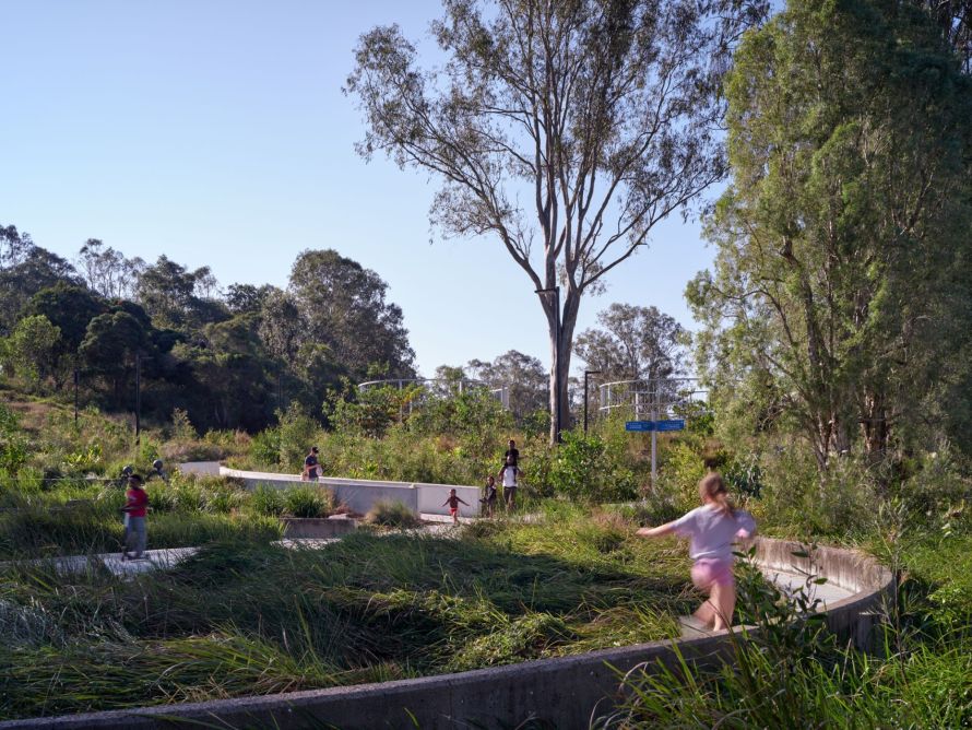 Children playing in wetlands park area